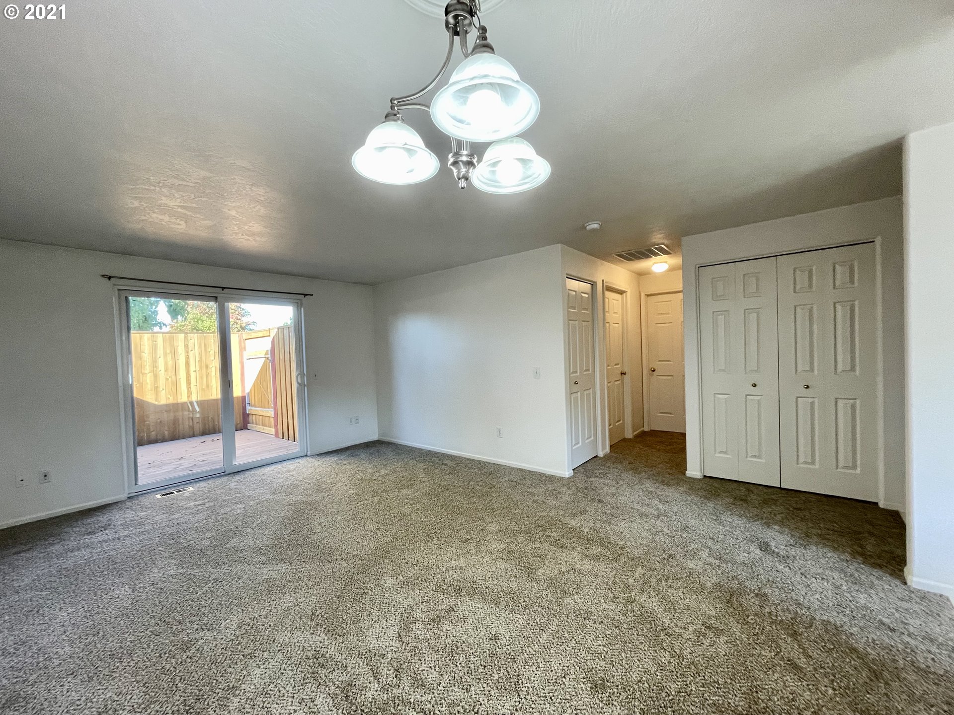 994 West L Street Springfield, OR 97477 - Photo 10 of 26 a view of an empty room with a window