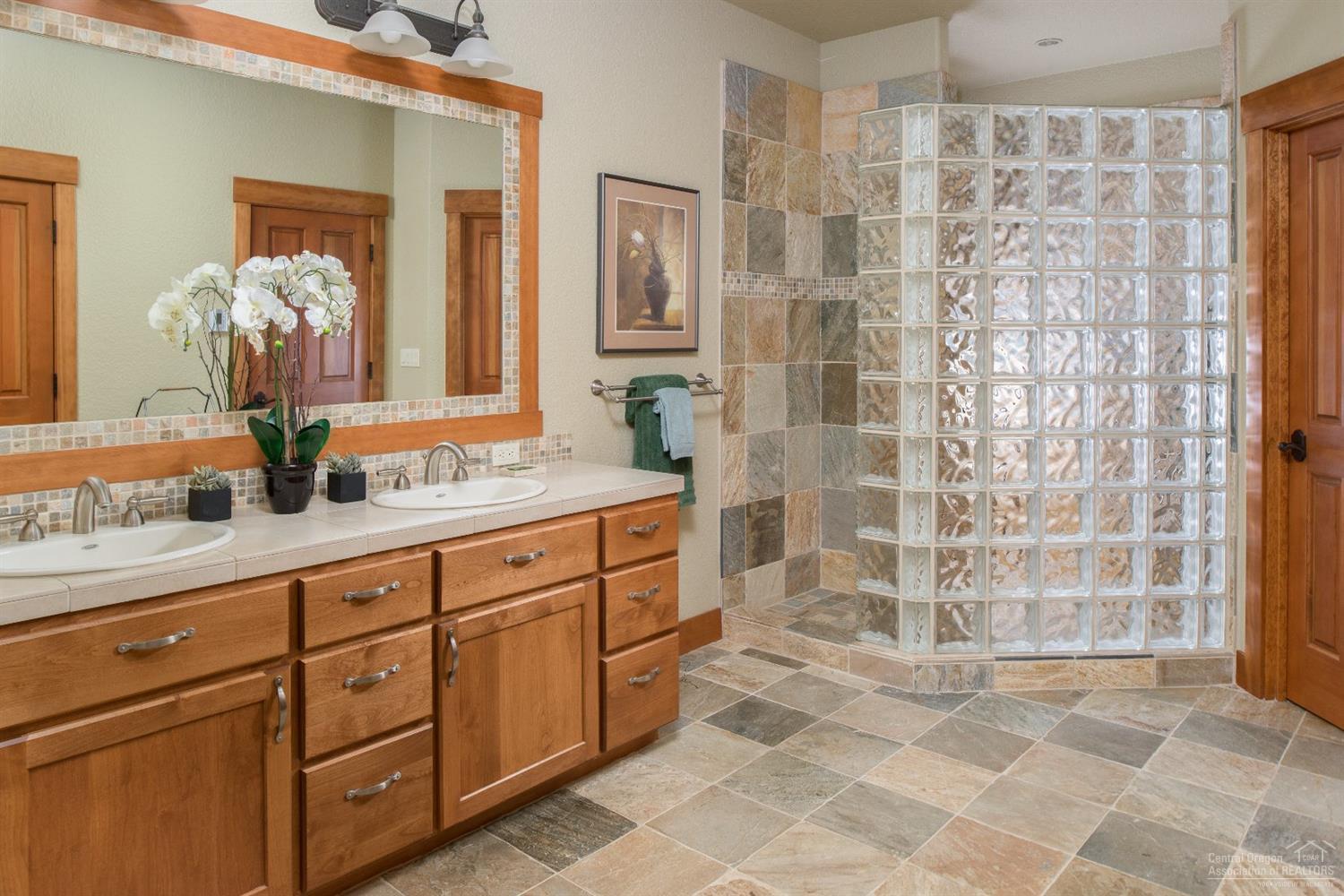 56902 River Road Sunriver, OR 97707 - Photo 14 of 24 Dual sinks, custom walk-in shower with 2
