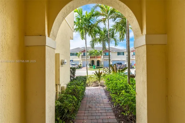 a view of a potted plants in front of a door