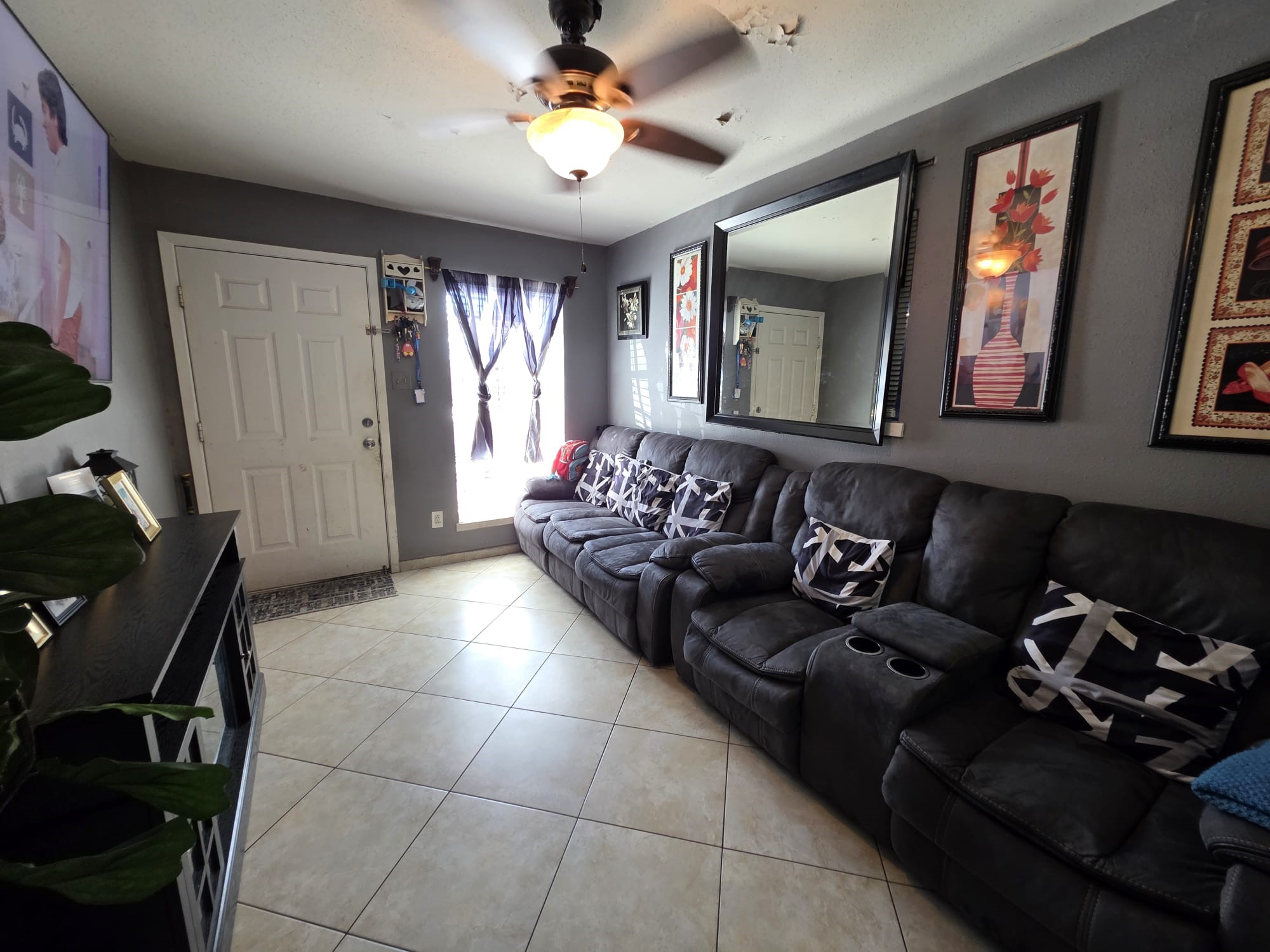 2415 West Little York Road, Unit D Houston, TX 77091 - Photo 3 of 16 a living room with furniture flowerpot and a window