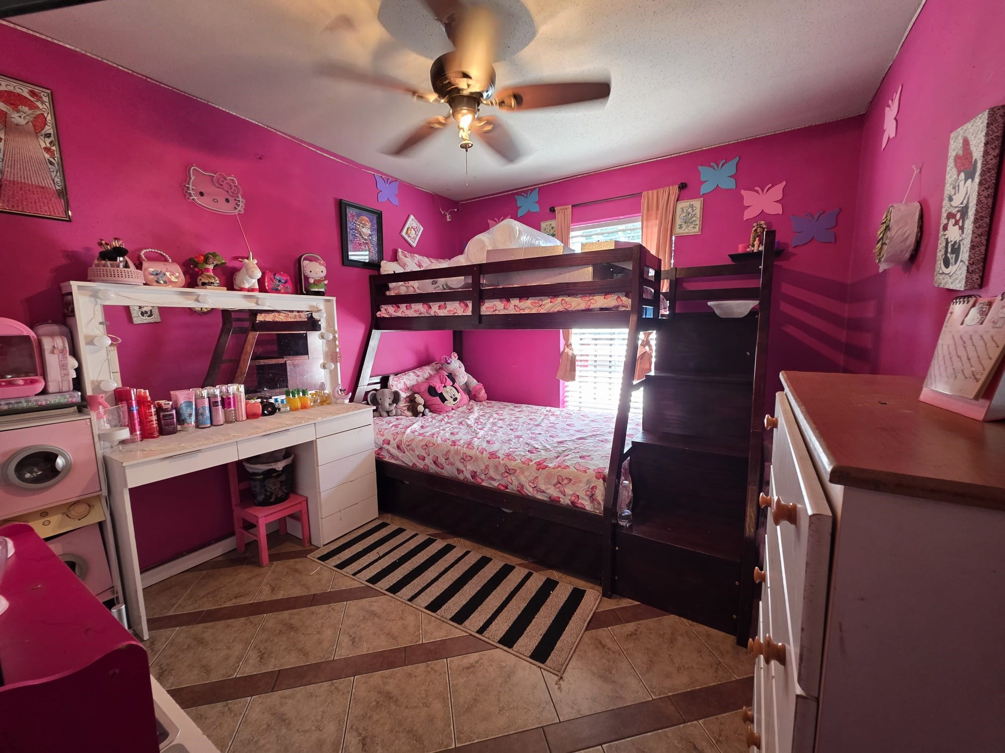 2415 West Little York Road, Unit D Houston, TX 77091 - Photo 6 of 16 a bedroom with furniture and a fireplace