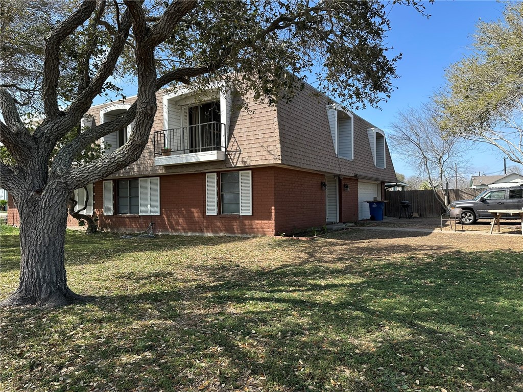 310 Sunset Boulevard Portland, TX 78374 - Photo 17 of 18 a front view of a house with a yard