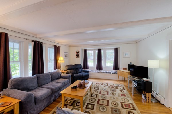 22 Havelock Road Worcester, MA 01602 - Photo 10 of 30 a living room with furniture and a flat screen tv