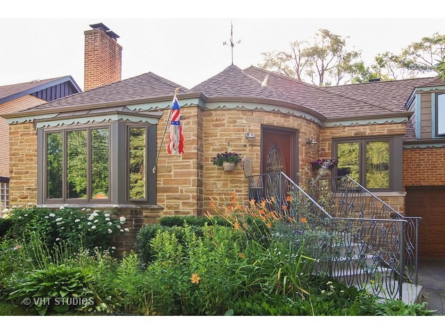732 Selborne Road Riverside, IL 60546 - Photo 2 of 23 a front view of a house with garden