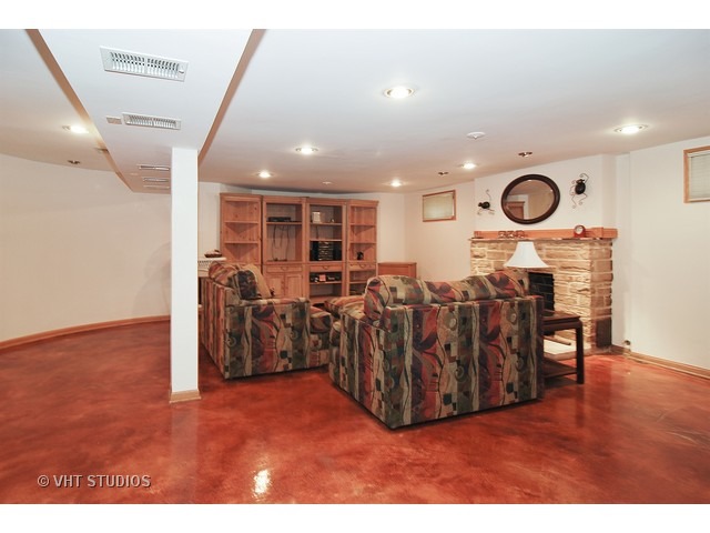 732 Selborne Road Riverside, IL 60546 - Photo 14 of 23 a view of a room with lots of wooden furniture