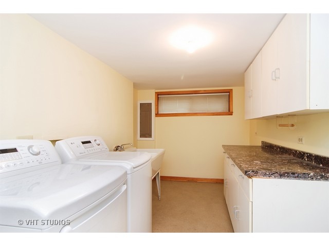 732 Selborne Road Riverside, IL 60546 - Photo 18 of 23 a utility room with sink dryer and washer