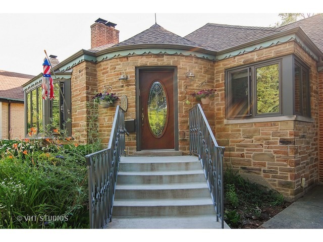 732 Selborne Road Riverside, IL 60546 - Photo 23 of 23 a front view of a house with a garden