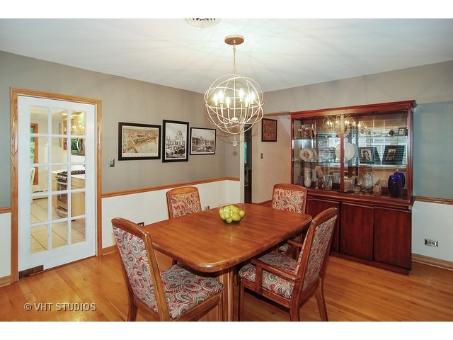 732 Selborne Road Riverside, IL 60546 - Photo 5 of 23 a view of a dining room with furniture window and wooden floor