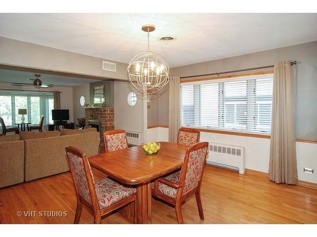 732 Selborne Road Riverside, IL 60546 - Photo 6 of 23 a view of a dining room with furniture and wooden floor
