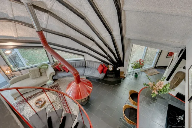 a view of an entryway and livingroom