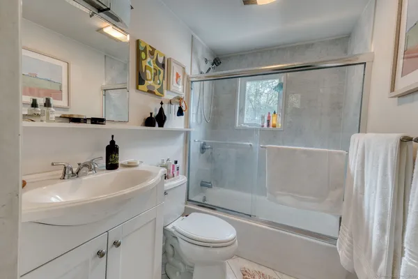 a view of a hallway with a small white roof