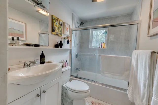 a view of a hallway with a small white roof