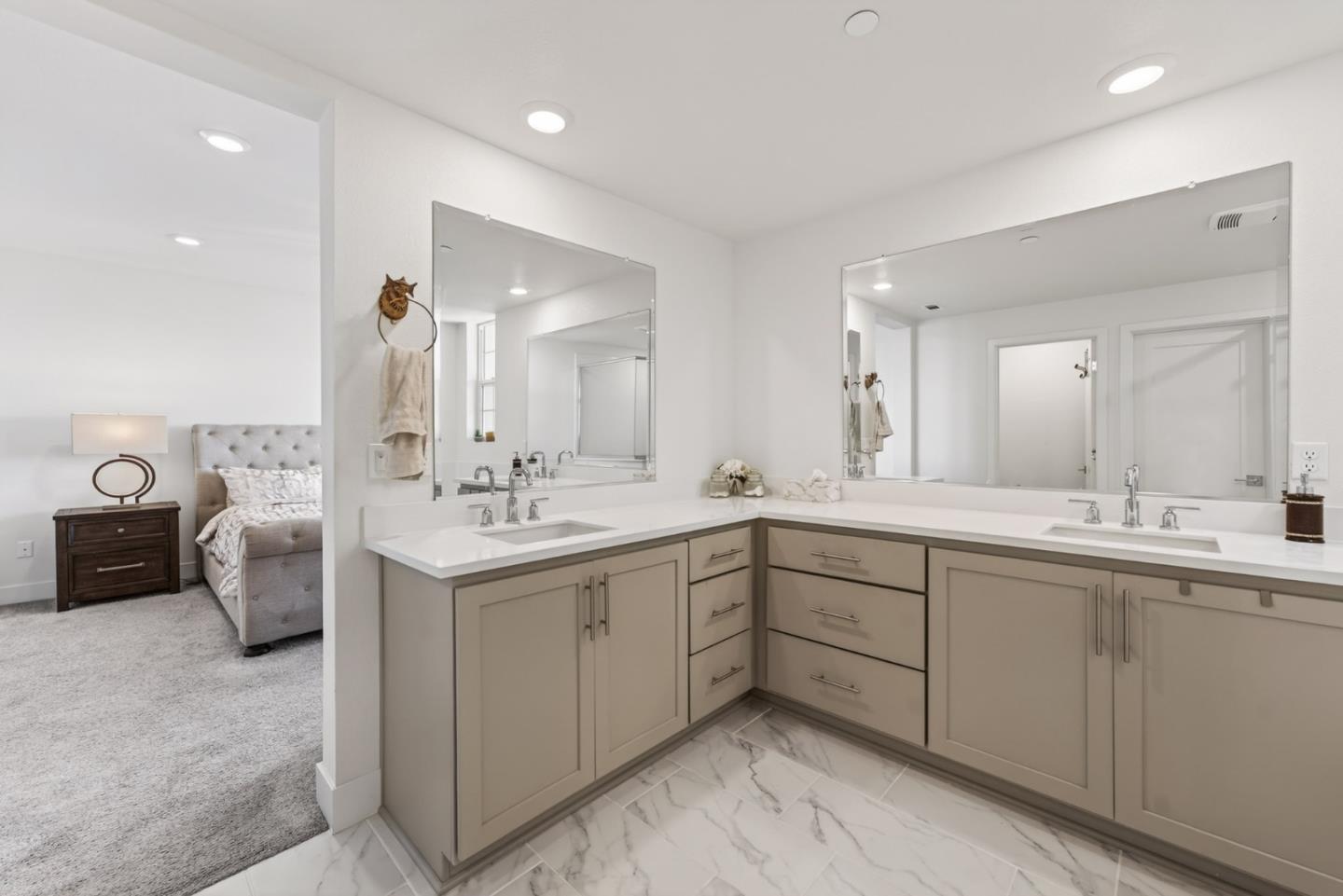 9532 Seawind Way Newark, CA 94560 - Photo 28 of 44 a spacious bathroom with a double vanity sink mirror and