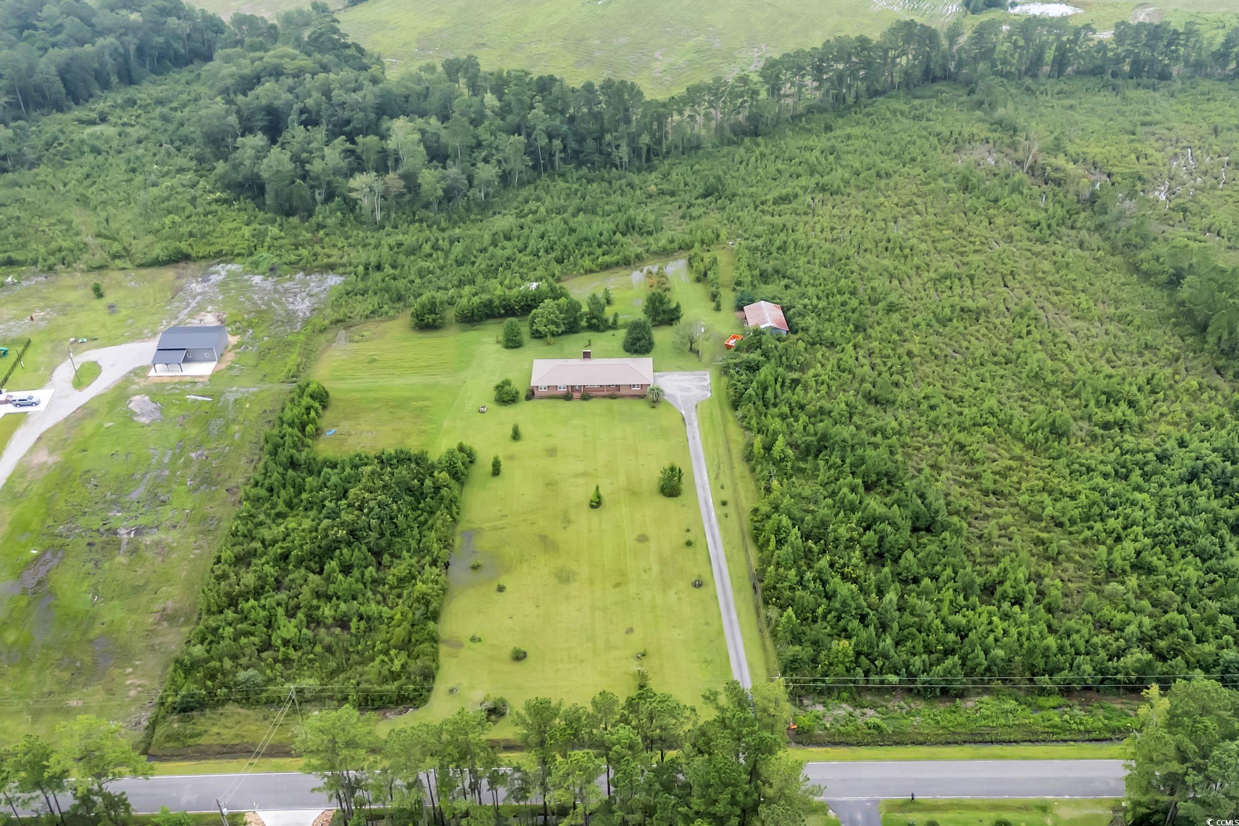 1928 Emery Road Loris, SC 29569 - Photo 20 of 24 Overview of rural landscape with a forest
