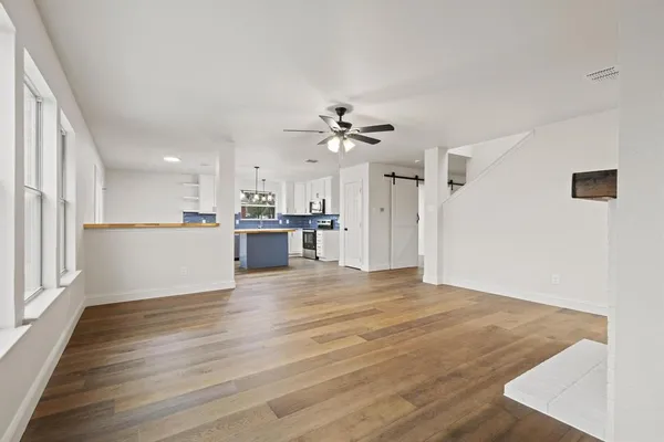 a view of a kitchen with a sink and a kitchen