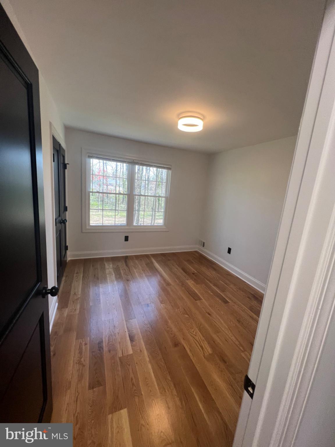 4400 Rendale Court Olney, MD 20832 - Photo 20 of 47 Bright and airy room with hardwood floors.