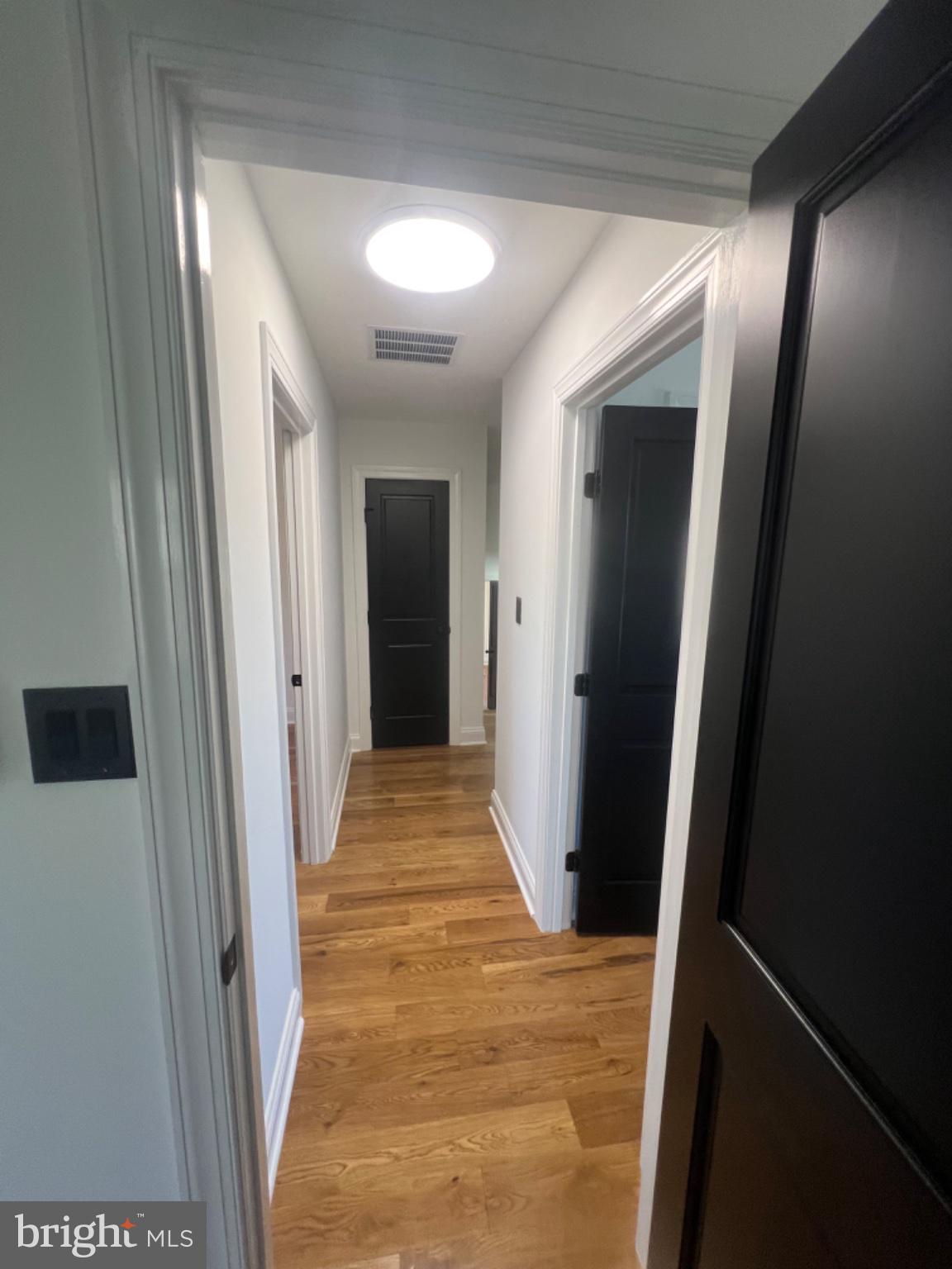 4400 Rendale Court Olney, MD 20832 - Photo 23 of 47 Modern hallway with sleek design.