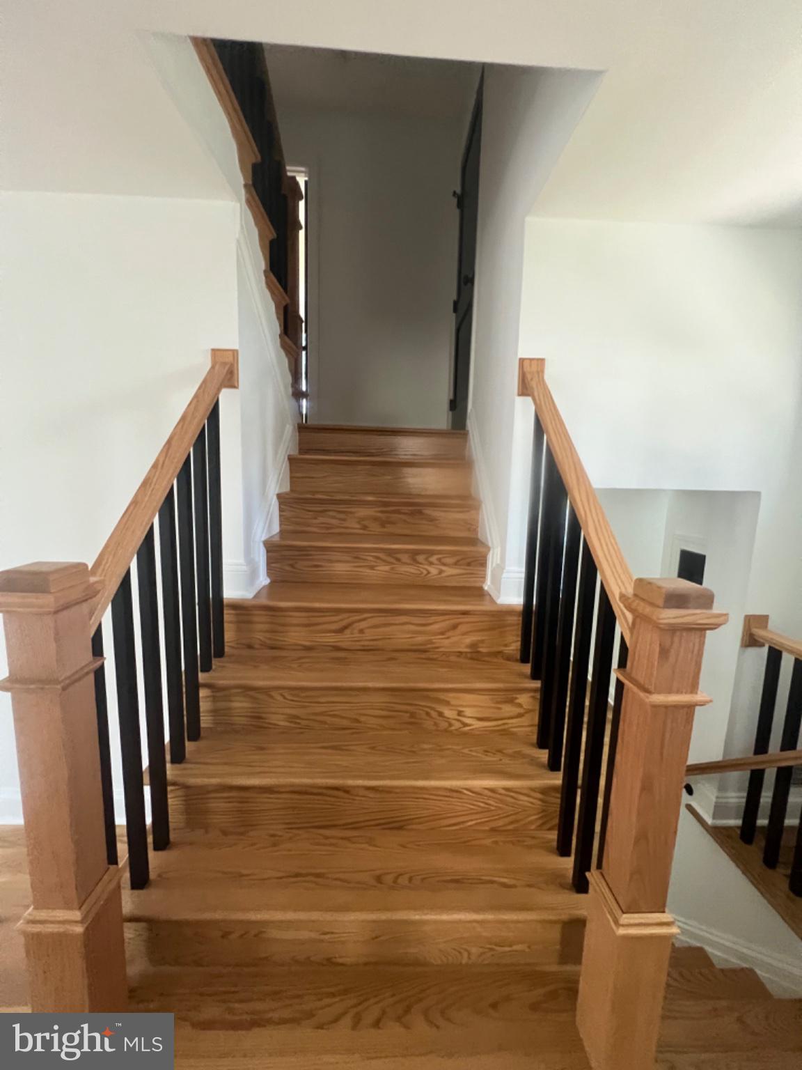 4400 Rendale Court Olney, MD 20832 - Photo 31 of 47 Elegant wooden staircase invites you up.