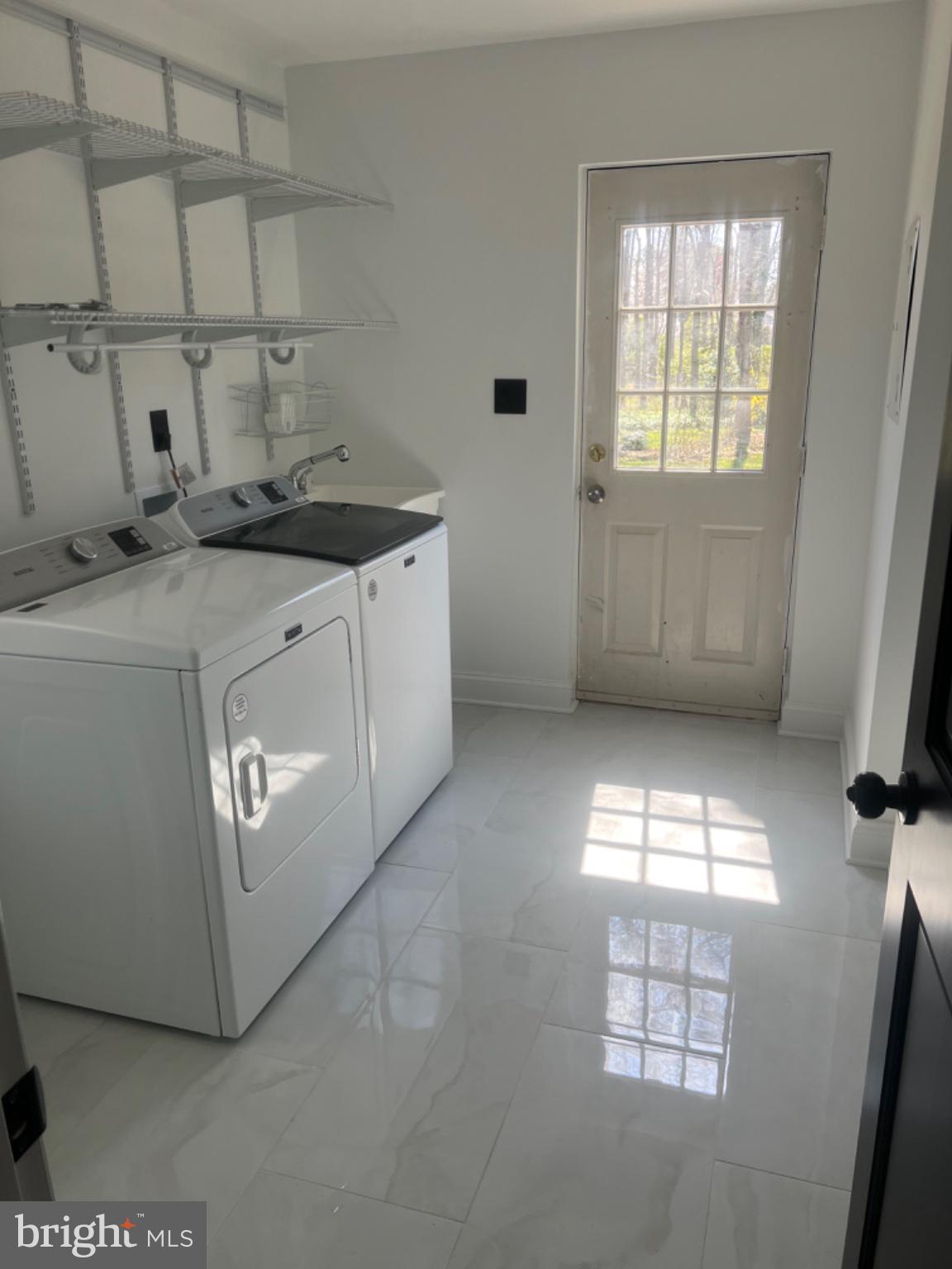 4400 Rendale Court Olney, MD 20832 - Photo 43 of 47 Bright and airy laundry space.