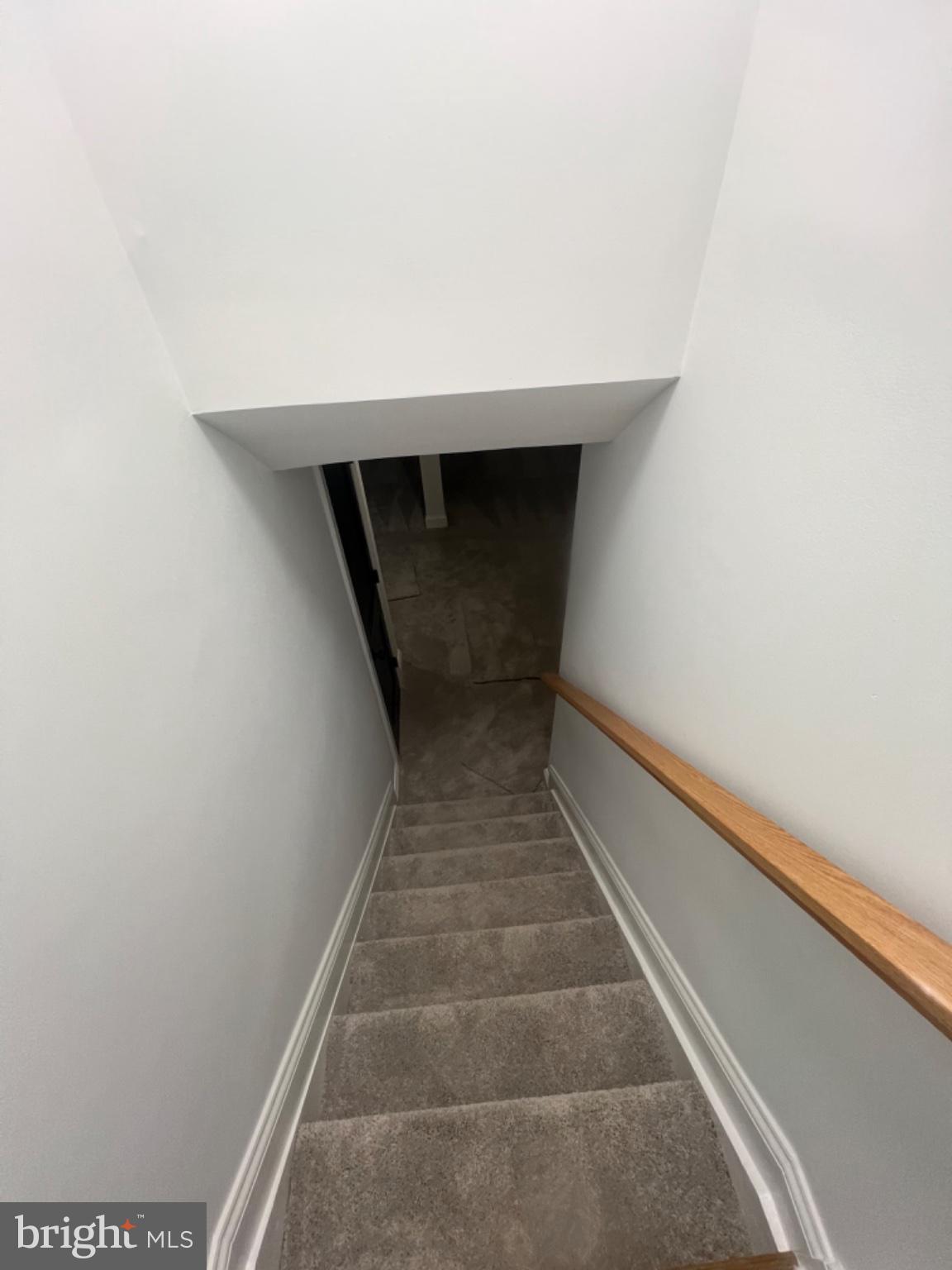 4400 Rendale Court Olney, MD 20832 - Photo 45 of 47 Inviting descent into cozy spaces.