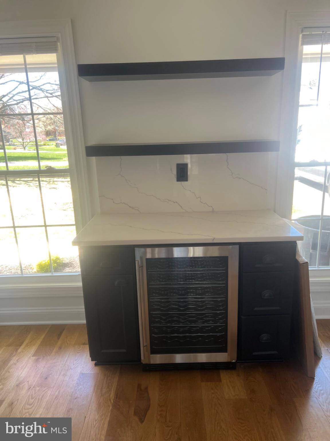 4400 Rendale Court Olney, MD 20832 - Photo 6 of 47 Sleek bar area with modern finishes.