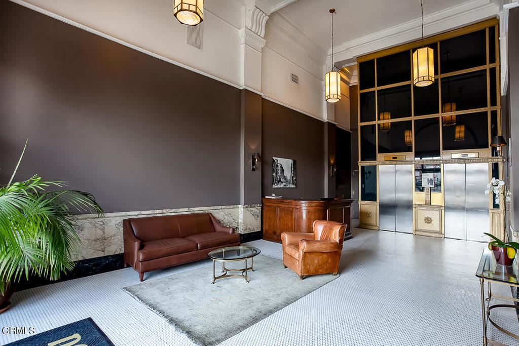 257 South Spring Street, Unit PHE Los Angeles, CA 90012 - Photo 24 of 29 a living room with furniture