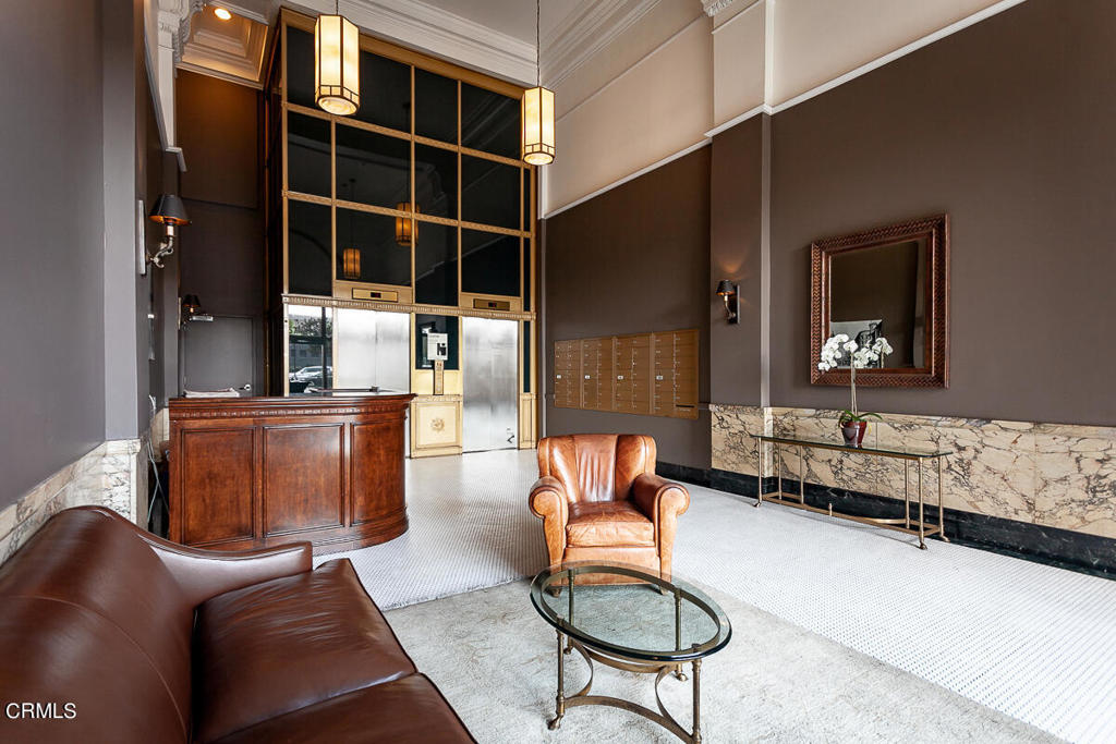 257 South Spring Street, Unit PHE Los Angeles, CA 90012 - Photo 27 of 29 a living room with furniture