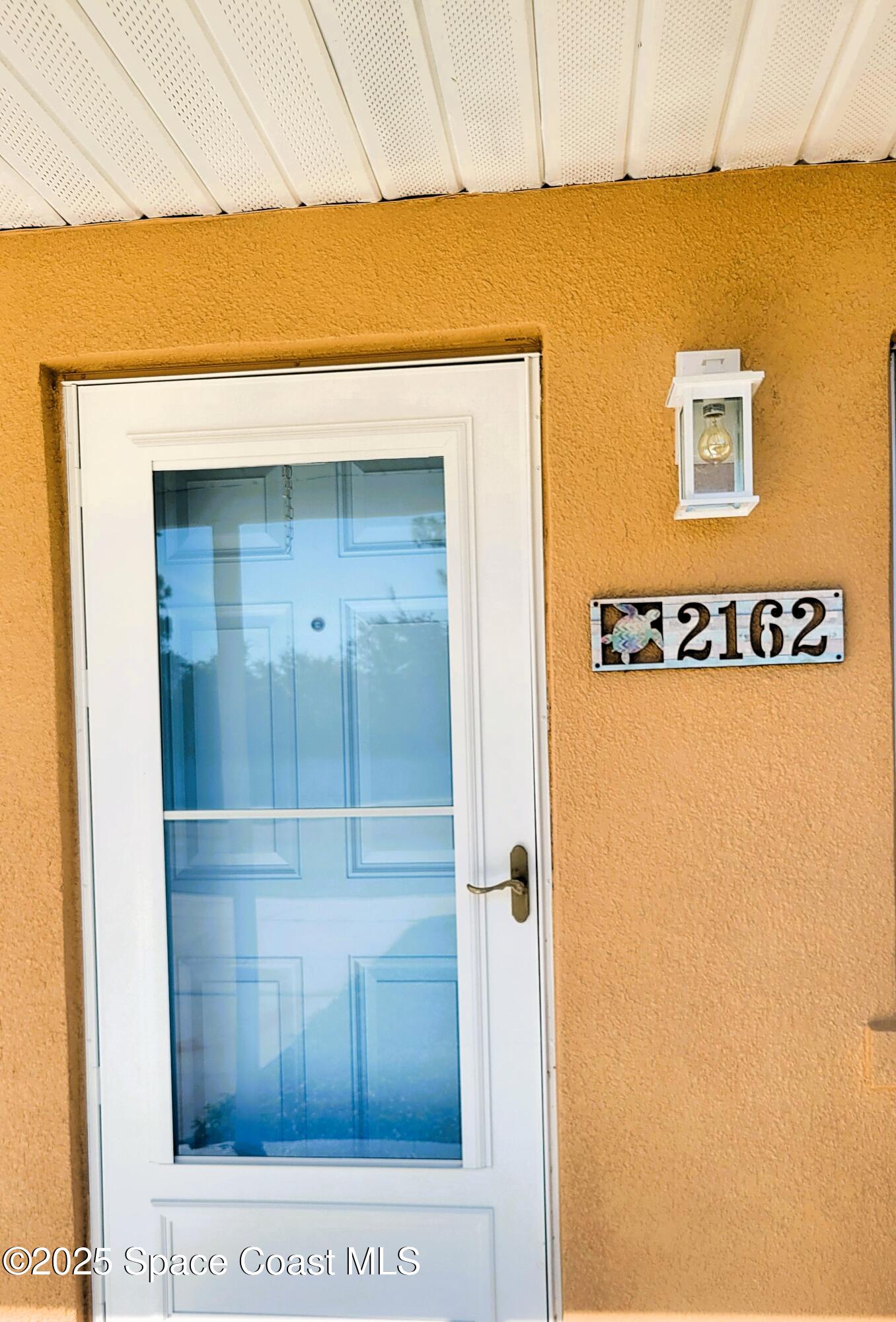2162 Post Road Melbourne, FL 32935 - Photo 7 of 37 a view of a door