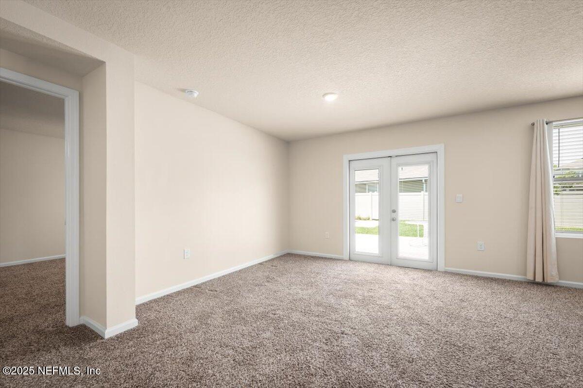 2080 Denton Trace Green Cove Springs, FL 32043 - Photo 21 of 32 an empty room with windows