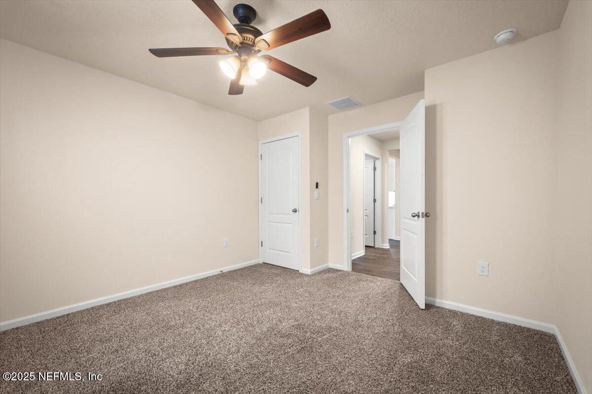 2080 Denton Trace Green Cove Springs, FL 32043 - Photo 10 of 32 an empty room with fan