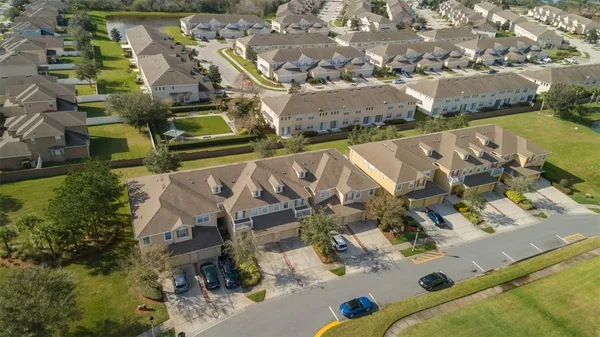 an aerial view of a house with a ocean view