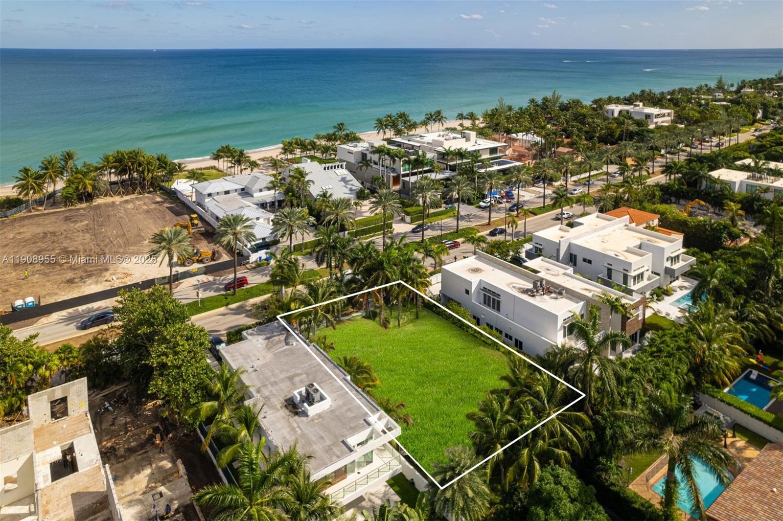 284 Ocean Boulevard Golden Beach, FL 33160 - Photo 19 of 20 an aerial view of a house with a lake view