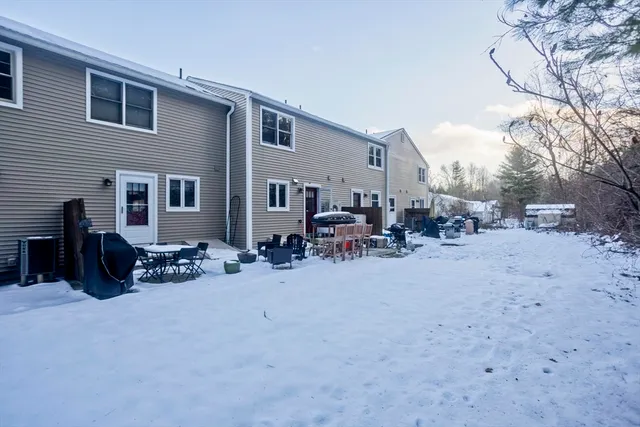 a view of a patio with a yard