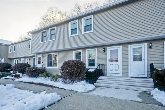 a front view of house with yard and seating space