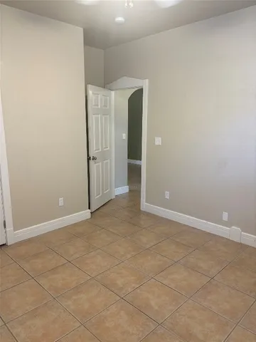 an empty room with an entryway