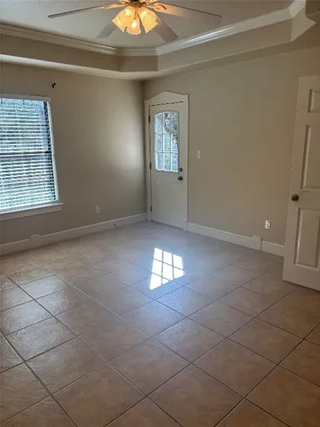 a view of an empty room and window