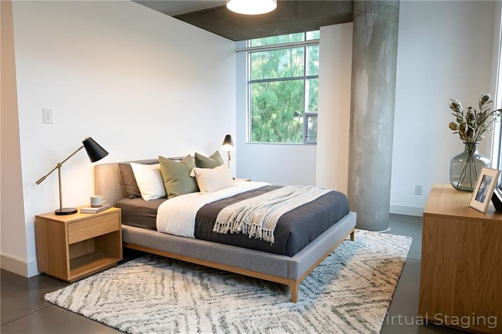 850 Ralph McGill Boulevard Northeast, Unit 30 Atlanta, GA 30306 - Photo 14 of 21 a bedroom with bed and a window