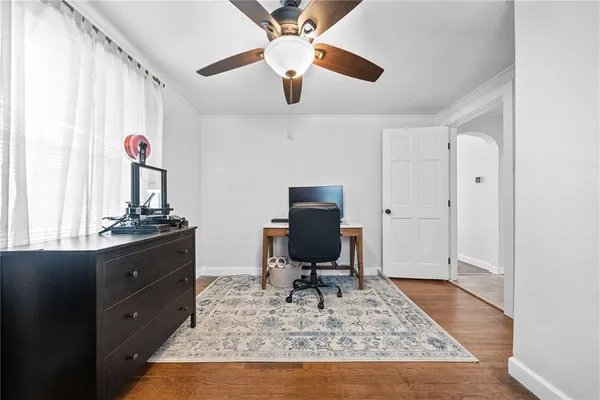 a workspace with furniture and window