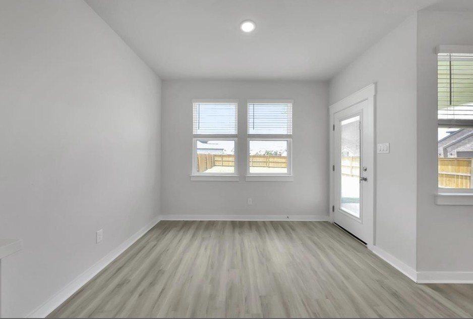 300 Old Trinity Way Georgetown, TX 78628 - Photo 9 of 16 Entryway featuring light wood-type flooring and baseboards
