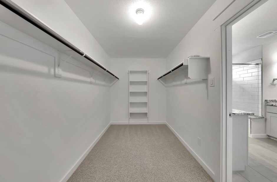 300 Old Trinity Way Georgetown, TX 78628 - Photo 10 of 16 Walk in closet featuring light carpet