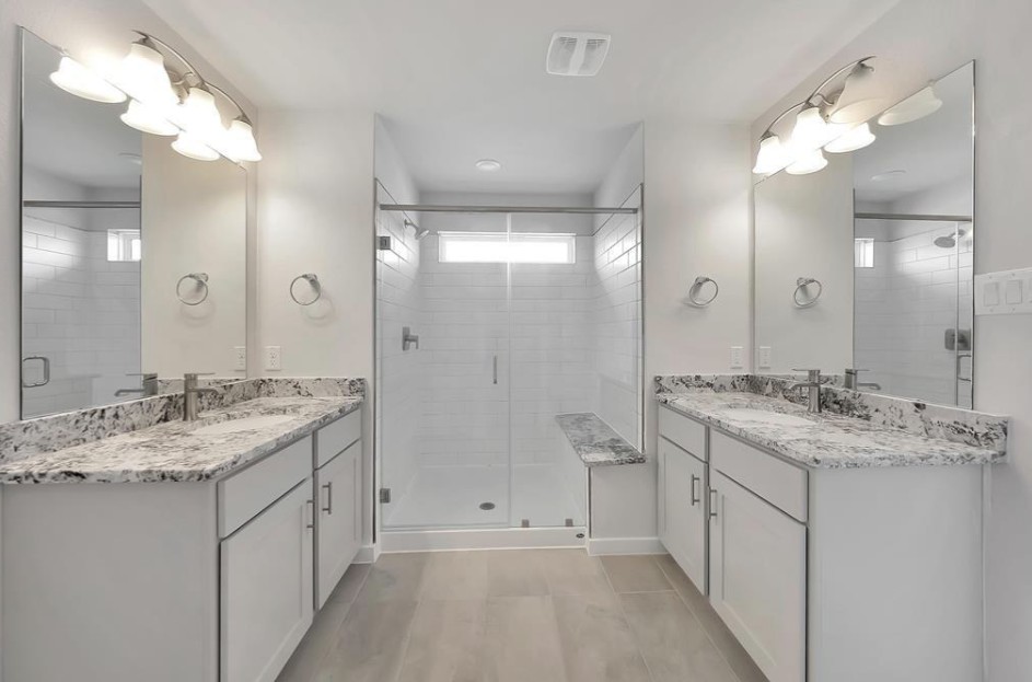 300 Old Trinity Way Georgetown, TX 78628 - Photo 11 of 16 Full bath featuring two vanities and a stall shower