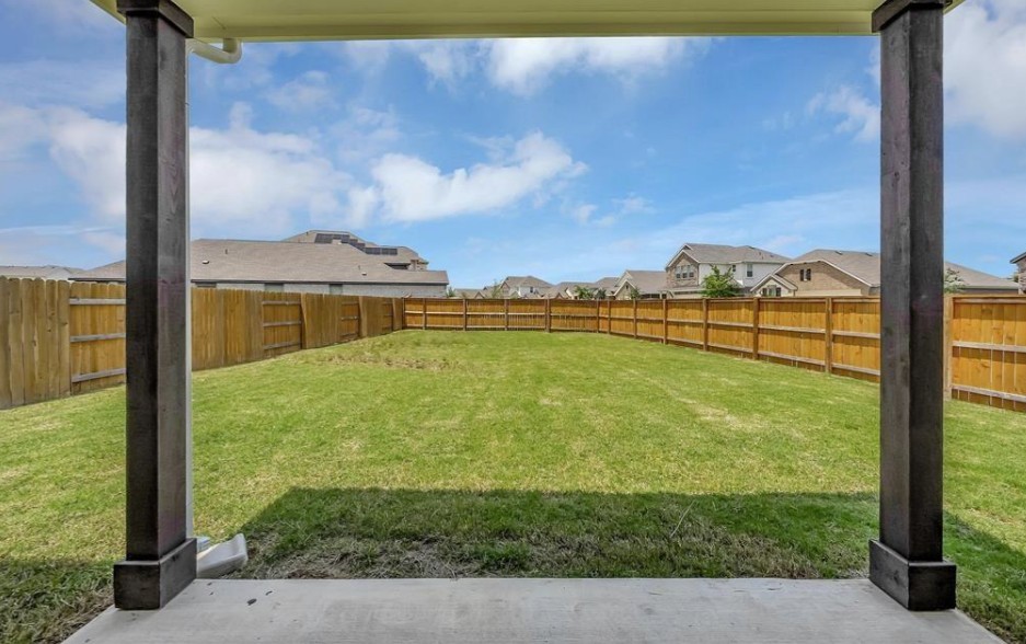 300 Old Trinity Way Georgetown, TX 78628 - Photo 14 of 16 Fenced backyard featuring a patio area and a residential view