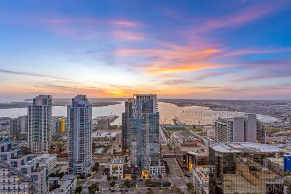 a view of a city with tall buildings