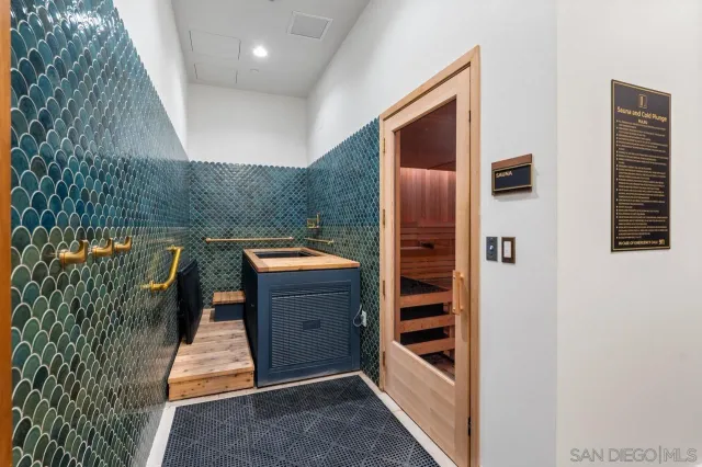 a swimming pool with outdoor seating and yard