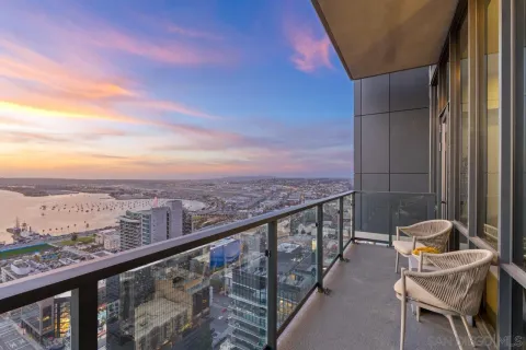 a kitchen with sink stove and cabinets