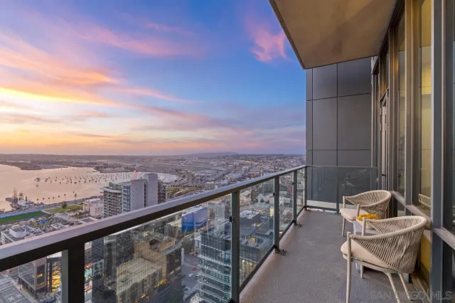 a kitchen with sink stove and cabinets