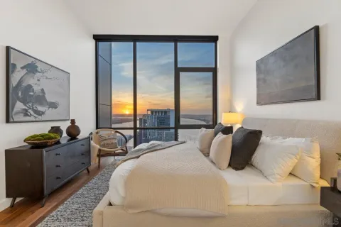 a kitchen with sink a stove and cabinets
