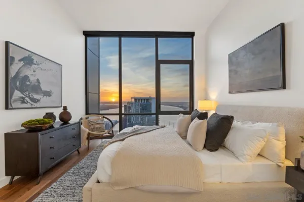 a kitchen with sink a stove and cabinets