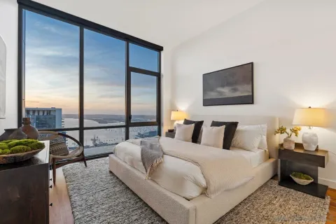 a kitchen with stainless steel appliances a lot of counter space and a wooden floors