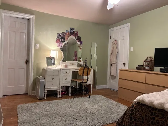 a room with furniture and a dresser